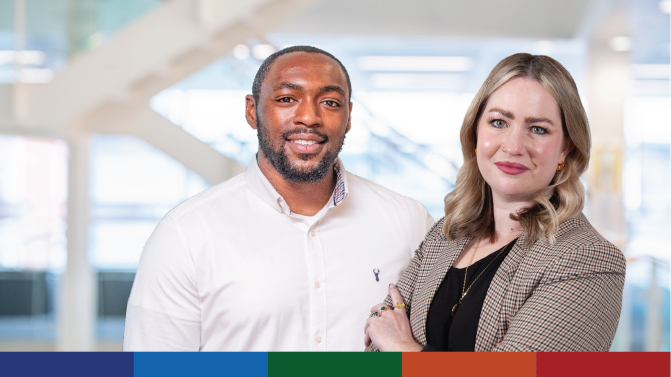 An image of two staff members in an office.